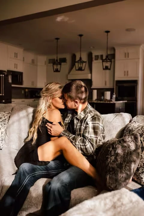 Warm close-up portrait of a couple holding each other